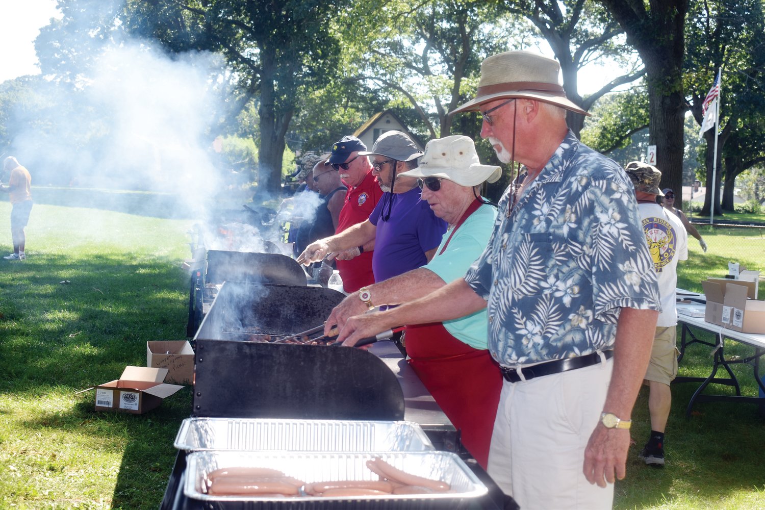 CLASSIC COOKS: These Elks were among the Elks from all over the state who cooked countless hots and hamburgers for upwards of 1,200 special needs guests during last week’s 365 Outing.